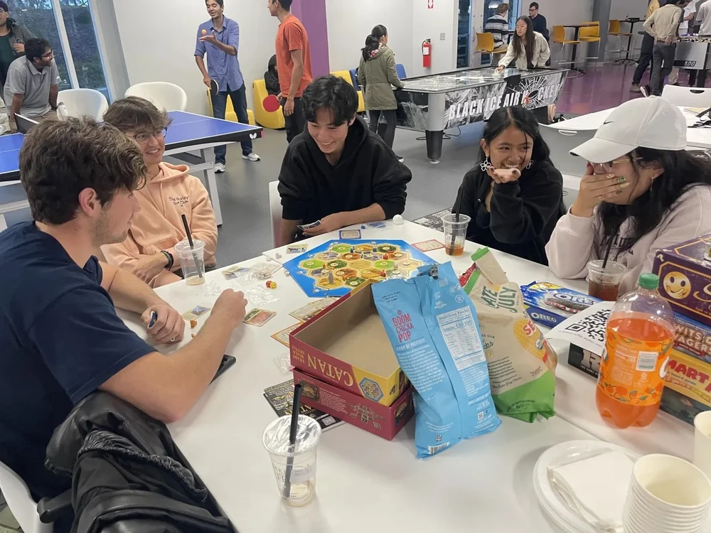 Students gathered for a Scholars Society game night